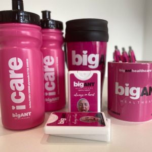 Photo of mug, water bottles, travel mugs and hand sanitiser all in same Big Ant Healthcare range