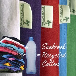 Zoomed in image of Seabrook range of bags with labels and pile of t-shirts and plastic bottle to show what they're made from.